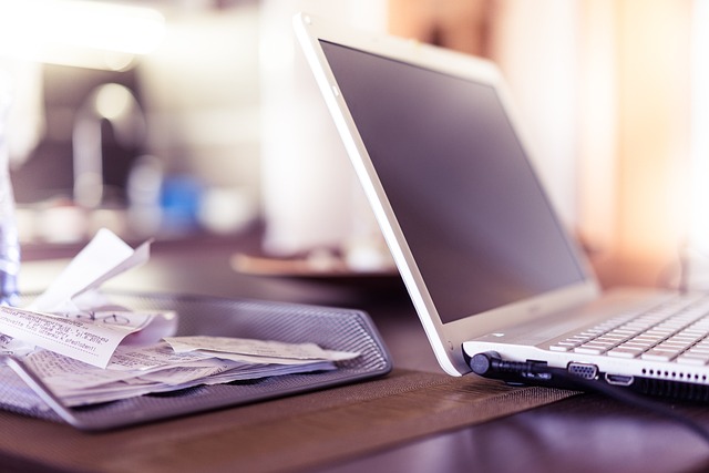 Computer with receipts 